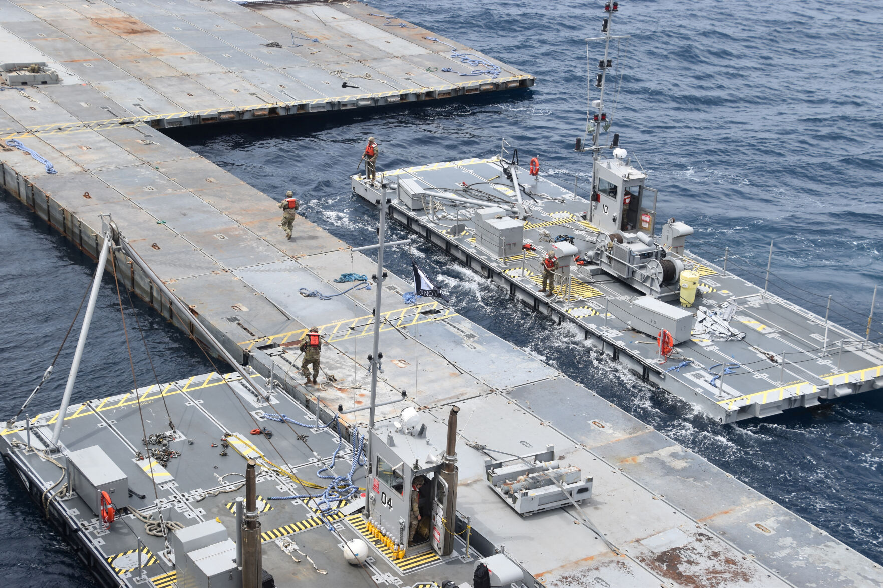 The US is wrapping up a pier to bring aid to Gaza by sea. But danger and uncertainty lie ahead